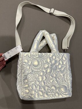 Urban Outfitters iridescent puffy tote bag